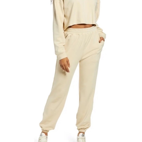 NWT WEWOREWHAT x REVOLVE Brushed Back Terry Cream Joggers, Large - Picture 1 of 10